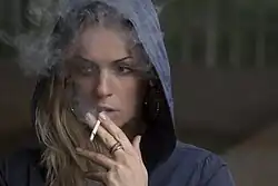 An example of fashion photography involving cigarettes.