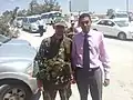 فؤاد صحراوي رفقة جندي من الجيش العربي السوري في مدينة القصير بحمص بعد تحريرها - تموز 2013