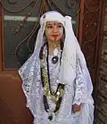"الملحفة البيضاء" الزي الجزائري العربي لنساء المغير.