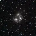 Vela ring galaxy والنجم اللامعHD 88170.