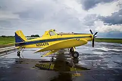 Air Tractor AT-502B on the ramp at Belle Glade Airport, Florida as weather moves in off Lake Okechobee. The single-engine aircraft has a 52-foot wingspan, three wheels. It was first manufactured in 1987.
