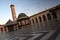 صحن الجامع الأموي ويظهر قبتي الوضوء في الصورة