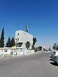 ساعة ملعب مدينة الحسن الرياضية من الخلف