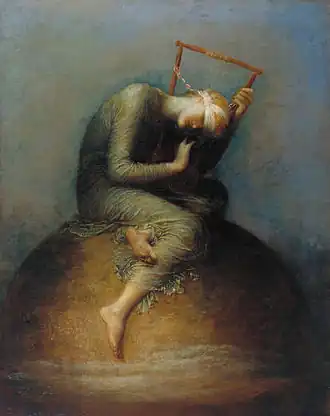 blindfolded girl sitting on a giant orange