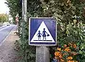 France: old-style school zone sign.