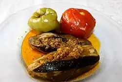Badımcan dolması (stuffed eggplant) from Azerbaijan, together with tomato and bell pepper dolmas
