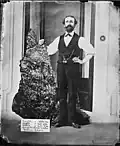 برنهارد هولترمان&nbsp;&nbsp;[لغات أخرى]‏ وعيّنة ذهب "قطعة هولترمان" في منجم نجمة الأمل في عام 1872.