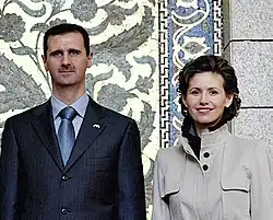 أسماء الأسد رفقة الرئيس السوري بشار الأسد في العام 2003.