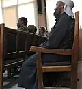 مسيحيون من القبايل الأمازيغ يؤدون الصلوات في كنيسة إنجيلية محليَّة.