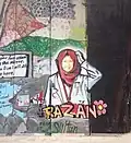 جدارية تمثل الناشطة الفلسطينية رزان النجار