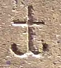 كيا (التجمع الرأسي للحروف الساكنة"كا"  و "يا" )، كما هو الحال في "Sa-kya-mu-nī " ( 𑀲𑀓𑁆𑀬𑀫𑀼𑀦𑀻، "حكيم من شاكياس")