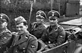SD men in Poland 1939. From left to right in the rear seats: SS-أونتشتونفوهرر and SS-اوباشافوهرر. The SD men are wearing army shoulder straps, akin to the فافن إس إس.
