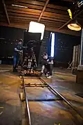 A skateboard dolly (with tripod mounted on top)
