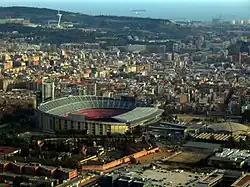 Barcelona stadium seen from above. It is a large and asymmetrically shaped dome.