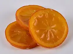 شرائح البرتقال المسكرة المزججة&nbsp;[الإنجليزية].