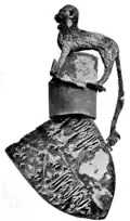 Shield, helmet and crest of إدوارد الأمير الأسود, suspended over his tomb in كاتدرائية كانتربري