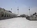 The shrine is fronted by a large courtyard for devotees to gather every Thursday night, as well as on other festival nights.
