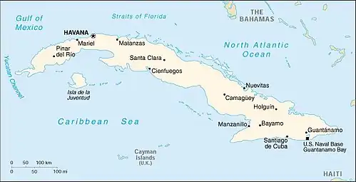 This is a white on blue map of Cuba as would be seen in a World Atlas.