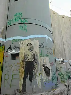 محمود درويش مرسوماً على جدار الفصل العنصري
