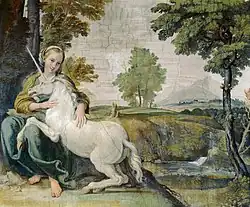 كان أحادي القرن الأبيض كثير الظهور في لوحات القرون الوسطى رمزاً للعذرية والطهارة. يظهر في لوحة الفنان دومنيكينو (حوالي 1602م) أحادي القرن بين يدي فتاة جالسة بالقرب من جذع شجرة.