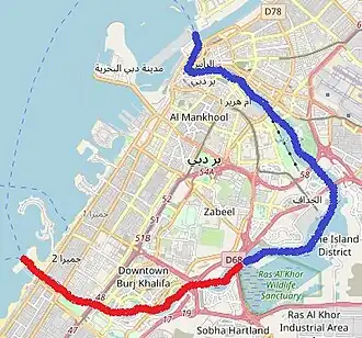 المسار الأصلي لخور دبي باللون الأزرق، الامتداد الجديد باللون الأحمر.