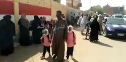 من أمام إحدى اللجان الانتخابية في مدينة أسوان.