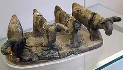 تم العثور على نموذج طيني لأربعة رؤوس من الأبقار&nbsp;&nbsp;[لغات أخرى]‏ في العمرة (حوالي 3500 قبل الميلاد)