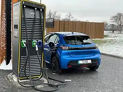 Electric car charges at high power charger with ccs standard