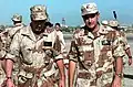 الرئيس جورج دبليو بوش (الأب) في زيارته لمطار مقديشيو الدولي في 1 يناير 1993م.