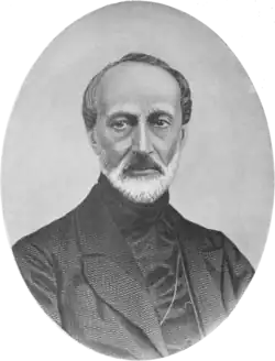 Black-and-white half-length portrait of a thin, angular balding man