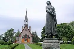 Grand Pré memorial church and statue of Evangeline.