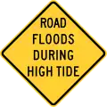 Road floods during high tide, Hawaii.