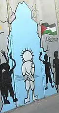 جدارية تمثل شخصية حنظلة التي اشتهر بها الرسام الفلسطيني المُغتال ناجي العلي