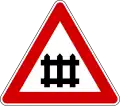 Italy rail crossing with gates sign.