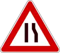 U.K., Italy and Latvia road narrows from the right.