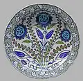 Dish with cloud scrolls that are similar to those on the lamp, and a rock and wave border, c. 1550