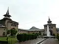 The courtyard of the Jama Masjid, Srinagar. Hari Parbat is visible in the background.