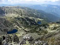 Aerial photo of mountains, valley and two lakes