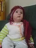 طفلة من اليوروك في الزى التقليدى taç