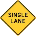 New York State one lane road ahead sign.