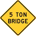 New York State restricted weight bridge ahead sign.