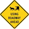 Horse-drawn vehicle ahead, Ohio.