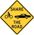Pennsylvania share the road sign.