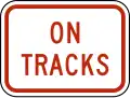 On tracks plaque