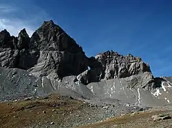 Martinsloch (Martins hole) is visible in the center of the Tschingelhörner in the Glarus Alps