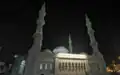 منظر جانبي لمسجد مريم أم عيسى (مسجد الشيخ محمد بن زايد سابقاً) ليلاً.