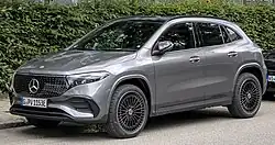 Front three-quarters view of a grey crossover SUV