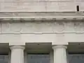 Early 20th century Americanized metopes, using bison in place of cow skulls (bucranium)