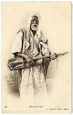 كناوة من الجزائر مع غمبري (حوالي 1906) لجان جيزر (1848-1923).