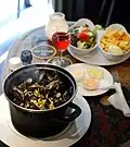 Mussels are usually served with fries and dipping sauces